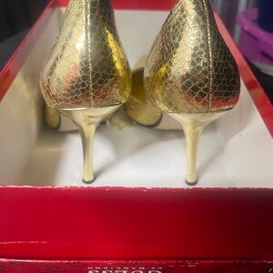Guess by Marciano gold pumps